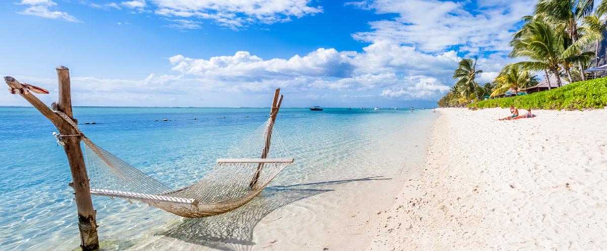 Image of holiday beach with hammock